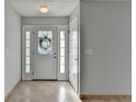 Bright entryway with tile flooring and neutral-toned walls at 175 Paris Dr, Lawrenceville, GA 30043