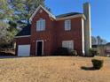 Two-story brick home with a large yard at 2919 Riverwalk Cv, Decatur, GA 30034