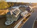 Aerial view of community building with adjacent parking at 29 Hydrangea Unit 72 Way, Auburn, GA 30011