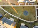 Aerial view of a community firepit and grassy area at 29 Hydrangea Unit 72 Way, Auburn, GA 30011