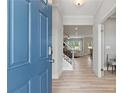 Bright and spacious entryway with hardwood floors and view to the living room at 316 Foxglove Way, Mcdonough, GA 30253