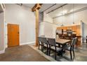 Dining area with large table and exposed beams at 350 Peters Sw St # 3, Atlanta, GA 30313