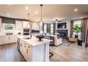 Open concept kitchen with island and stainless steel appliances at 715 Crossroad Ct, Powder Springs, GA 30127