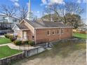 Side view of brick church building with grassy area at 193 Gibson St, Atlanta, GA 30316