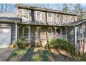 Front porch with stone accents and wooden railings at 4275 Blackland Dr, Marietta, GA 30067