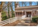 Side view of condo, highlighting private entrance at 293 Quail Run, Roswell, GA 30076