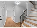 Bright entryway with hardwood floors and staircase at 4132 Rue Saint Germain, Stone Mountain, GA 30083