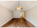 Living room with hardwood floors and high ceiling at 1708 Queen Victoria Ct, Locust Grove, GA 30248