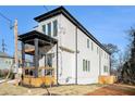 Modern farmhouse side view, showing two stories and a balcony at 862 Hobson Sw St, Atlanta, GA 30310