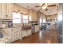 Spacious kitchen featuring a copper farm sink and hardwood floors at 75 Bent Arrow Dr, Stockbridge, GA 30281