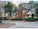 Brick home with large deck and mature trees at 850 Airline Rd. Rd, Mcdonough, GA 30252