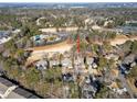 Aerial view of homes with a golf course and community amenities at 2585 Club Springs Drive, Roswell, GA 30076