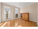 Home office with hardwood floors and built-in shelving at 3853 Cohutta Pass, Marietta, GA 30062