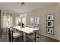 Bright dining room with hardwood floors and access to a deck at 2049 Mcafee Rd, Decatur, GA 30032