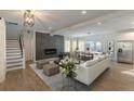 Open living area with fireplace, hardwood floors, and ample natural light at 2049 Mcafee Rd, Decatur, GA 30032
