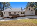 Back of house showing deck and yard at 272 Mckenzie Dr, Stockbridge, GA 30281