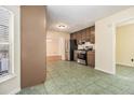 Kitchen with stainless steel appliances and tile floor at 272 Mckenzie Dr, Stockbridge, GA 30281