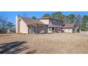 Large backyard with patio, pergola, and shed at 5024 Klondike Rd, Lithonia, GA 30038