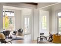Bright dining room with hardwood floors and stylish light fixture at 731 Belt Se Loop, Atlanta, GA 30316
