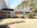 Brick ranch home with a small yard at 6354 Shannon Pkwy # 27D, Union City, GA 30291