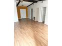 Spacious living room with hardwood floors and wood beams at 6354 Shannon Pkwy # 27D, Union City, GA 30291