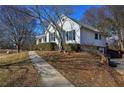 Side view of a white single-story house with attached garage at 857 Garner Rd, Rockmart, GA 30153