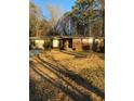 Brick ranch house with a large yard at 6050 Ledgewood Dr, Forest Park, GA 30297