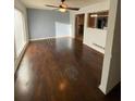 Living room with hardwood floors and large windows at 6050 Ledgewood Dr, Forest Park, GA 30297