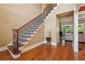 Elegant entryway with hardwood floors, a grand staircase, and high ceilings at 15 Amberly Ln, Cartersville, GA 30121