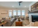 Spacious living room with sectional sofa and fireplace at 112 Redford Ln, Canton, GA 30115