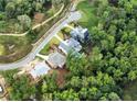 Aerial view of a luxury home community nestled in a wooded area at 4412 Brookview Se Dr, Atlanta, GA 30339