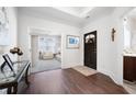 Bright and spacious entryway with hardwood floors and view of living room at 4980 Pleasantry Nw Way, Acworth, GA 30101