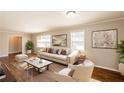 Bright living room featuring stylish furniture, hardwood floors, and ample natural light at 2937 Cascade Sw Rd, Atlanta, GA 30311