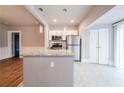 Updated kitchen, granite countertops, and stainless steel appliances at 3693 Aldea Dr, Decatur, GA 30032