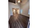 Spacious living room with dark brown wood-look flooring at 97 Paces Overlook Trce, Dallas, GA 30157