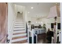 Interior view of staircase leading to kitchen and living area at 3371 Dogwood Dr # 120, Hapeville, GA 30354