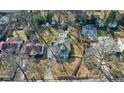 Aerial view showing house, yard, pool, and neighboring homes at 1608 Carroll Nw Dr, Atlanta, GA 30318