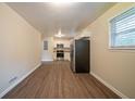 Eat-in kitchen with stainless steel appliances and light wood floors at 2476 Brentford Pl, Decatur, GA 30032