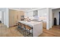 Stylish kitchen featuring an island with seating, modern appliances, and plenty of cabinet space at 2425 Peachtree Rd # 508, Atlanta, GA 30305