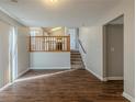 Spacious dining area with hardwood floors and view of kitchen at 2105 Sandtree Sw Ct, Atlanta, GA 30331