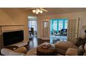 Bright and airy living room featuring high ceilings and plenty of natural light with an open floor plan at 219 Thorncrest, Stockbridge, GA 30281