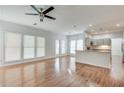 Spacious living room with hardwood floors and a fireplace at 2075 Carlysle Park Ln, Lawrenceville, GA 30044