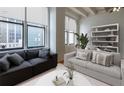 Spacious living room with two sofas and city view at 32 Peachtree Nw St # 804, Atlanta, GA 30303