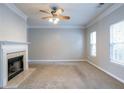 Bright living room featuring a fireplace and neutral color palette at 142 Benfield Cir, Cartersville, GA 30121