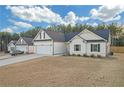 Two story home with attached garage and nice curb appeal at 180 Eryn Ter, Covington, GA 30014