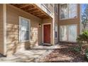 Condo's private entrance with red door and walkway at 906 Country Park Se Dr, Smyrna, GA 30080