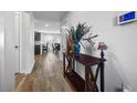 An entryway with hardwood floors and decorative accents at 909 Teabiscuit Way, Mcdonough, GA 30253