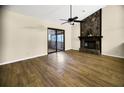Living room with hardwood floors and sliding glass doors at 778 Villa Way, Jonesboro, GA 30238