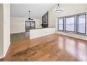 Spacious living room with hardwood floors and a stone fireplace at 778 Villa Way, Jonesboro, GA 30238