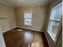 Comfortable bedroom offering natural light, hardwood floors, and a peaceful ambiance at 1929 Hazelwood Se Dr, Marietta, GA 30067